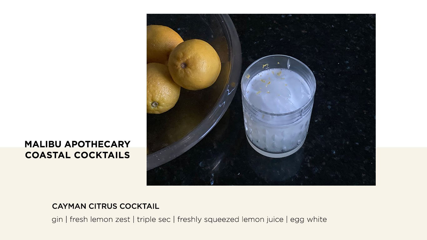 Clean Craft Coastal Cocktail inspired by the Cayman Islands with gin, fresh lemon zest, triple sec, freshly squeezed lemon juice, and frothed egg whites.