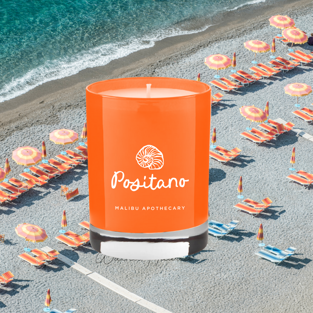 Positano candle over aerial Amalfi beach with vibrant umbrellas and blue sea, inspired by Italian coast
