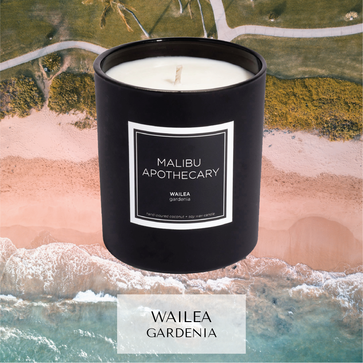 Matte black Malibu Apothecary candle labeled Wailea Gardenia overlaid on an aerial beach scene with shore and sea, made with all natural coconut and soy wax