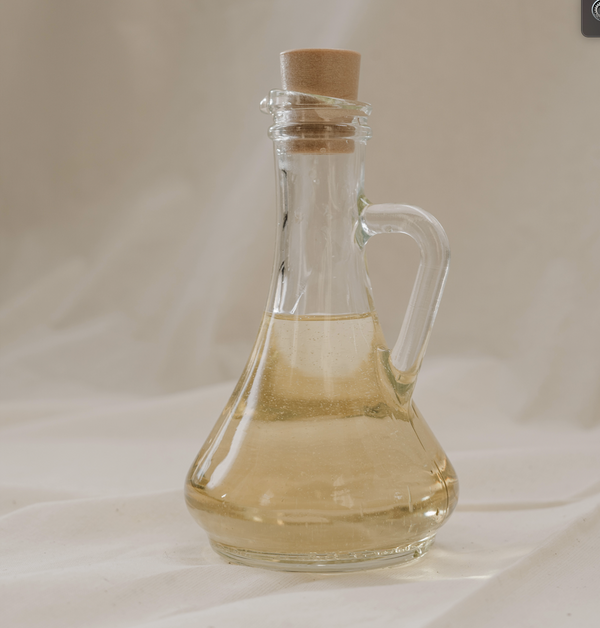 Fragrance Oil in a Jar with a linen background