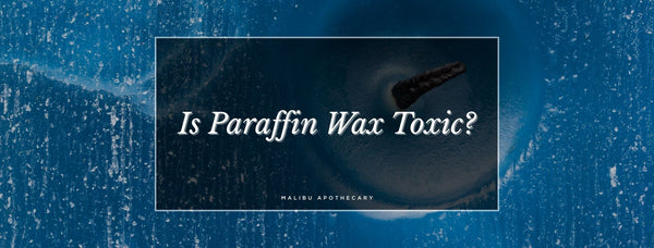 Close-up of a burned paraffin wax candle with dark soot and surface residue – hero image for Malibu Apothecary’s blog exploring the toxicity of paraffin wax, health risks of paraffin candles, and clean, non-toxic candle alternatives