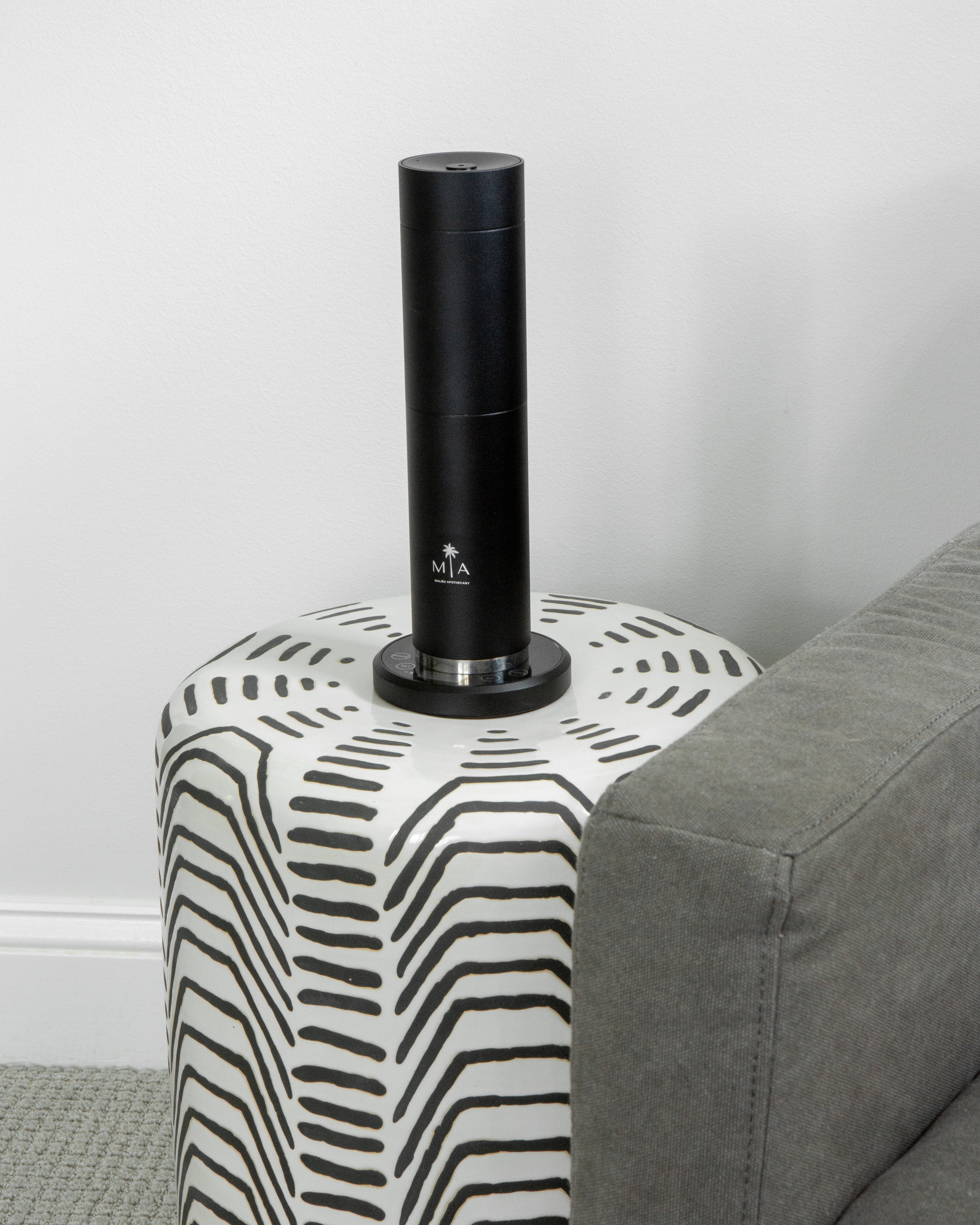 Commercial scenting machine by ScentSolution Pro in the AirScent aroma nebulizing diffuser sitting on a table in Malibu