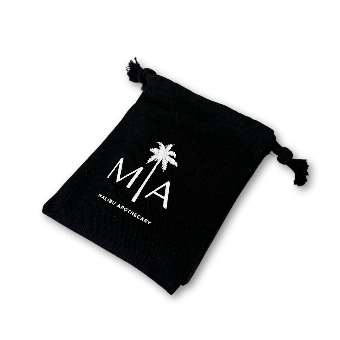 Linen bag in black with canvas rope and Malibu Apothecary logo holding samples of our signature scents