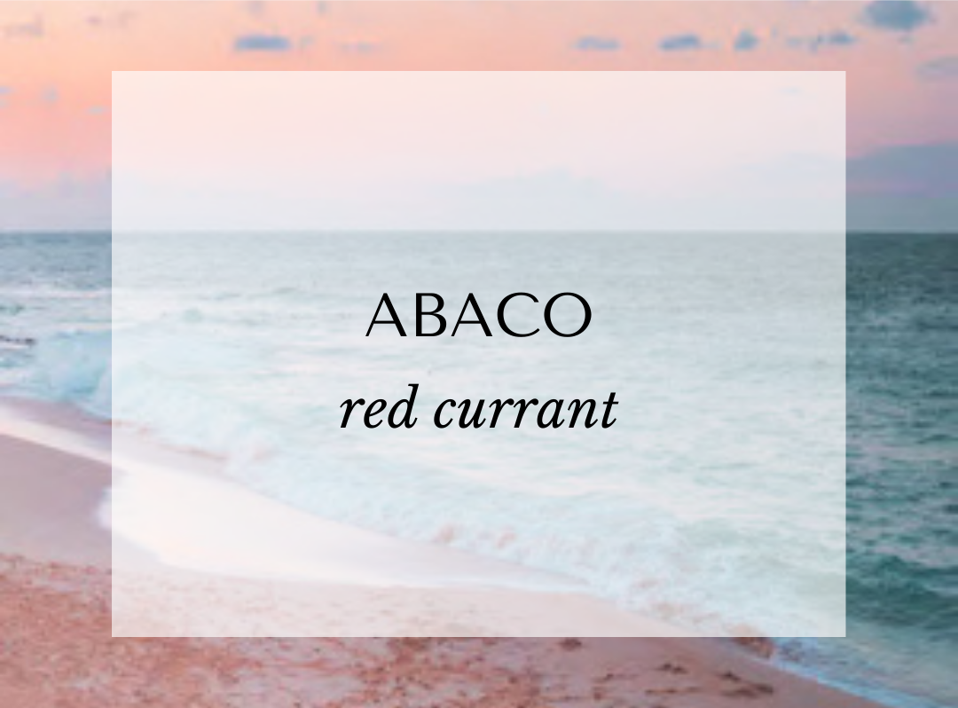 ABACO candle scent card by Malibu Apothecary inspired by the Bahamas, featuring a coastal background. Fragrance notes include red currant, grapefruit, lemon peel, jasmine, geranium, peach, black currant, and Abaco pine. A fresh, tart, and floral Caribbean fragrance crafted with non-toxic coconut and soy wax.