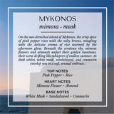 Mykonos mimosa and musk scent description card. A soft, sunlit fragrance with top notes of pink pepper and rice; heart notes of mimosa flower and almond; and base notes of white musk, sandalwood, and coumarin. Set against a serene Aegean backdrop, evoking warm island breezes and Mediterranean elegance.