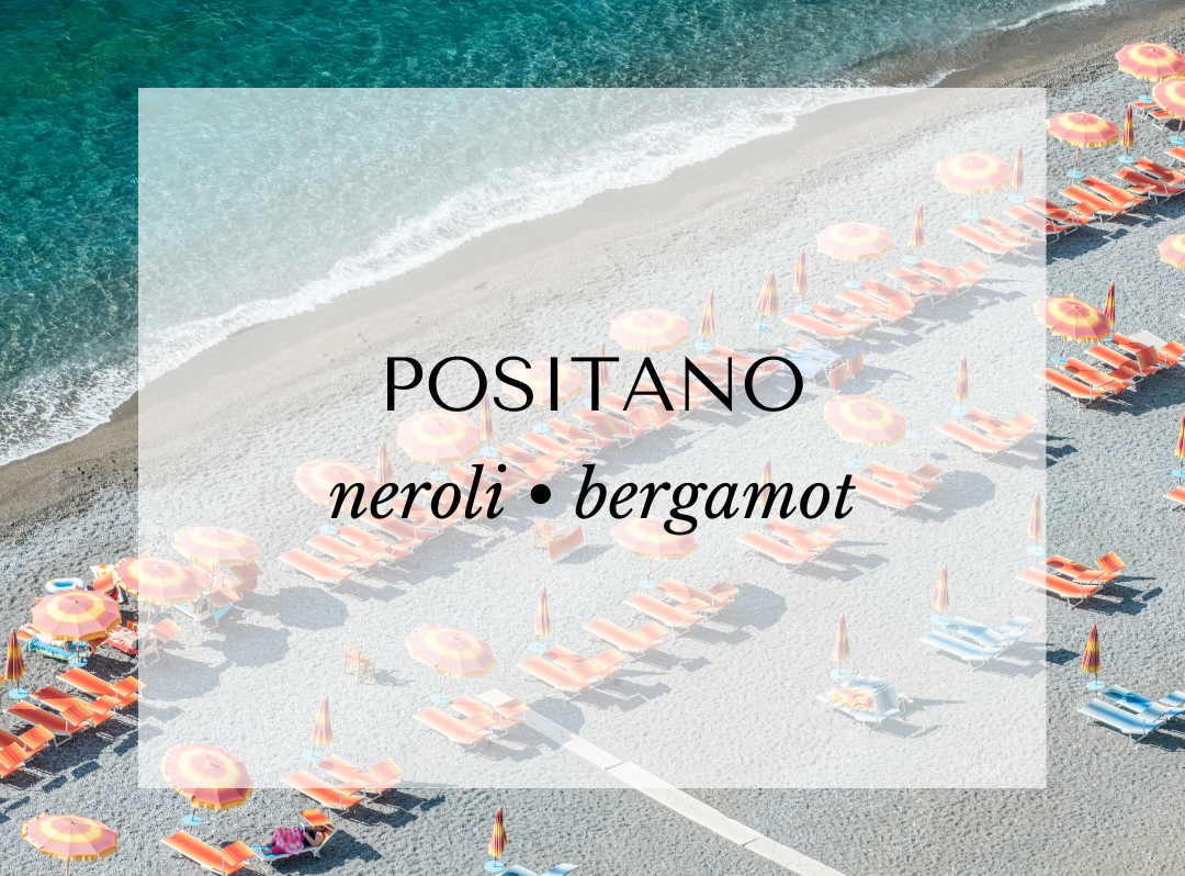 Positano candle scent card by Malibu Apothecary featuring a coastal Italian beach lined with umbrellas. Fragrance notes include bergamot, petitgrain, neroli, jasmine, sandalwood, and orange blossom. A citrusy floral fragrance inspired by Italy’s Amalfi Coast, crafted with clean-burning coconut and soy wax.