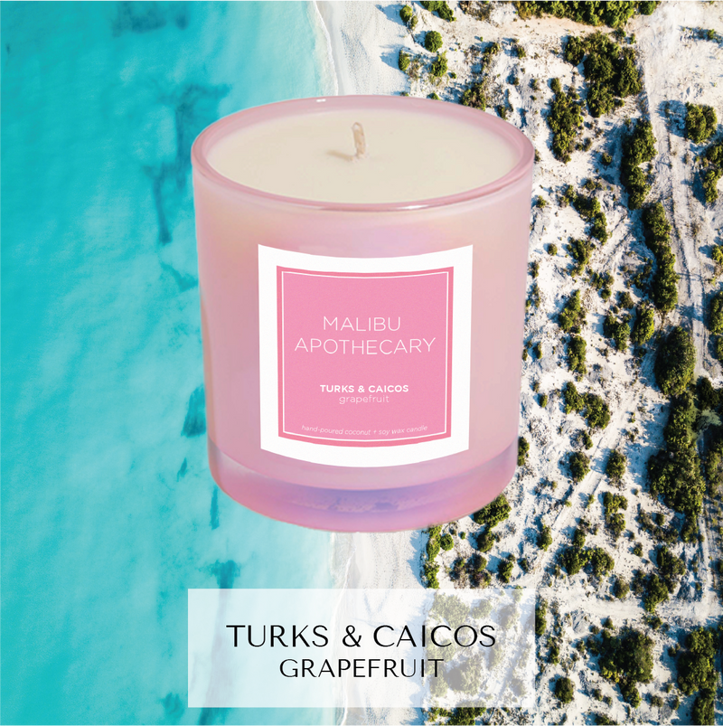 Turks & Caicos islands inspired candle with notes of grapefruit and mango in front of parrot cay, TCI