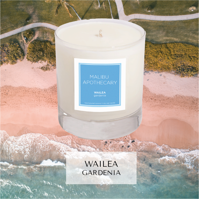 Wailea, Hawaii inspired candle with notes of gardenia in front of beach
